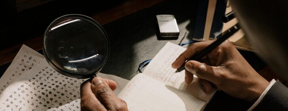 investigator-with-magnifying-glass